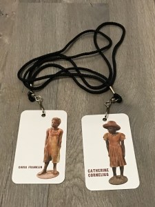 Photo of two Whitney Plantation tickets with lanyards.