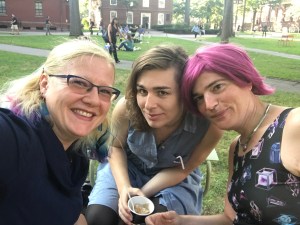 Picture of Crystal, Amelia, and Daria, circa September 2017, eating ice cream on Harvard Yard.