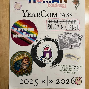 A white piece of paper that has "Year Compass: 2025 2026" printed on it. There are many stickers added to this cover, as well: a multicolored "HumanKindness" sticker in the colors of many types of LGBTQAI+ flags, a chibi owl and chibi cow, a purple and pink cartoon cat that says "meow," a rainbow circle that says "The future is inclusive," a cartoon mermaid, sleeping with a stuffed animal, which says "have hope," a cartoon sticker of The Tufts Daily newspaper, a whale, a plant, printed words "Thoughts and Prayers" (crossed out) with "Policy and Change" written below in larger type, and a quote from John Muir that says "And into the forest I go to lose my mind and find my soul."